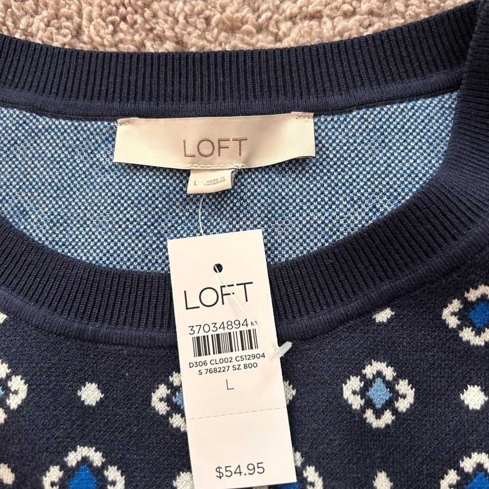 NWT Loft Navy w Blue & White Diamond Shaped Accents Sweater Vest V Neck

Size L - Picture 5 of 6